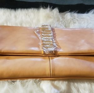 Butter scotch leather clutch
